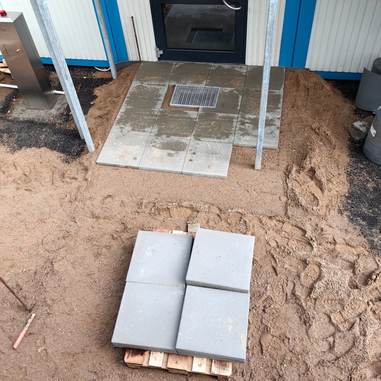 Travaux de pavage à l'entrée